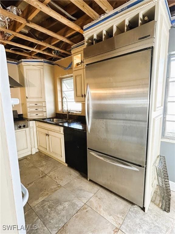 kitchen with sink and stainless steel built in fridge