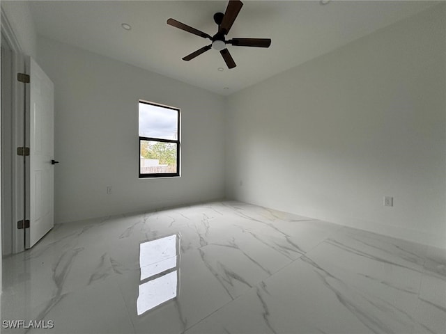 empty room featuring ceiling fan