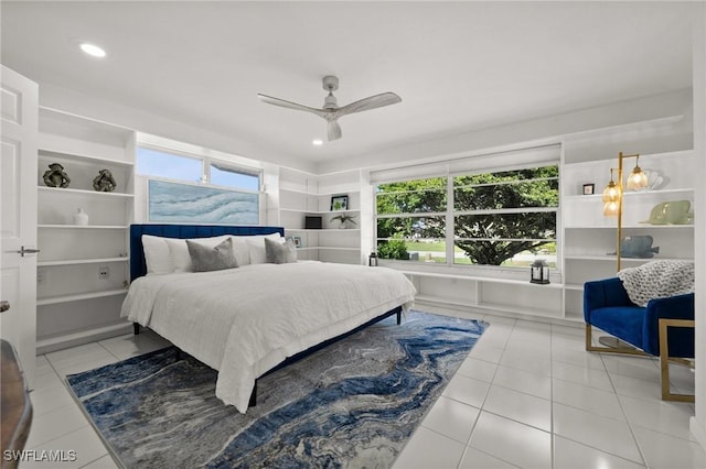 bedroom featuring ceiling fan and light tile patterned floors