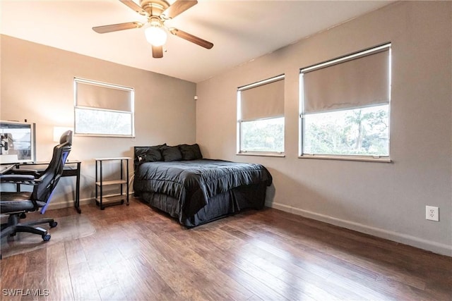 bedroom featuring ceiling fan and wood-type flooring