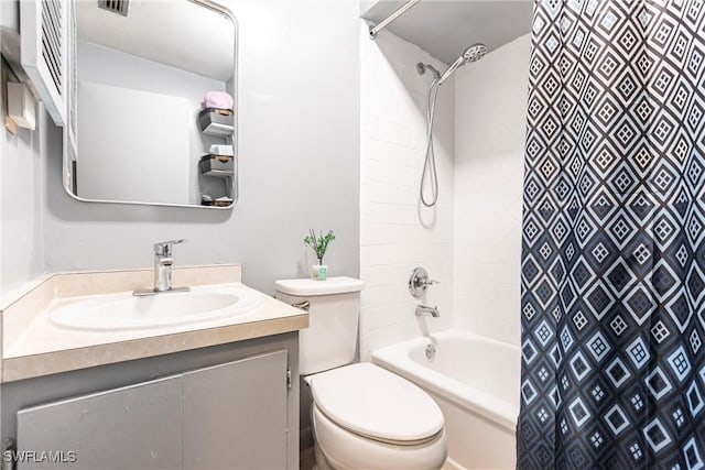 full bathroom featuring shower / bath combo, toilet, and vanity