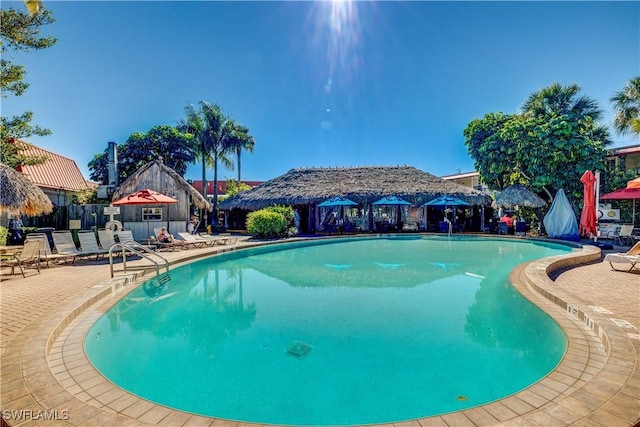 community pool featuring a patio area