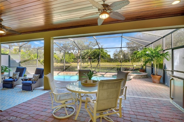 sunroom / solarium with wooden ceiling and ceiling fan