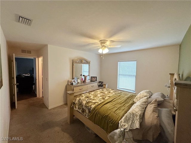 bedroom with ceiling fan and carpet flooring