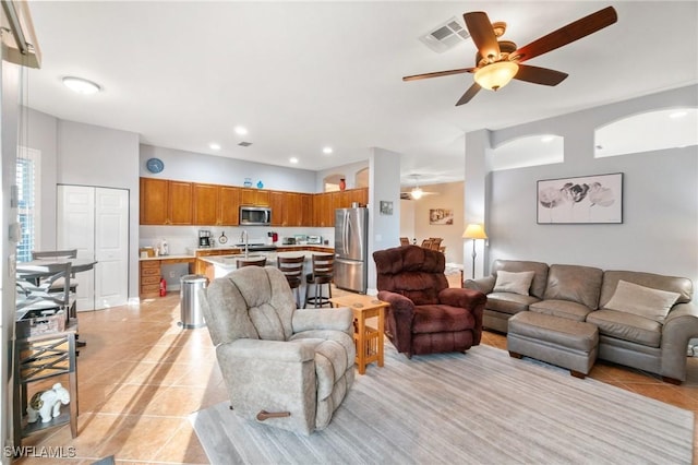 living room featuring recessed lighting, visible vents, a ceiling fan, and light tile patterned flooring