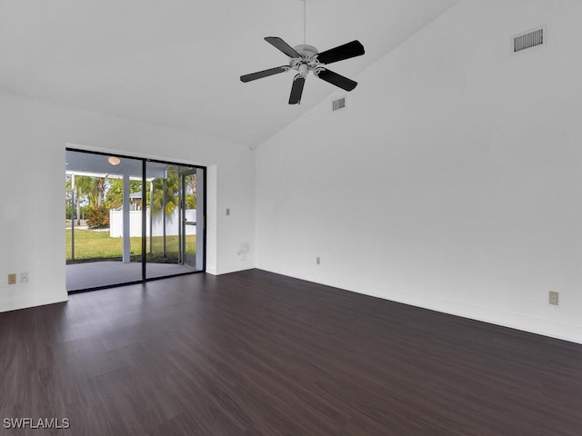 spare room with dark hardwood / wood-style floors, high vaulted ceiling, and ceiling fan