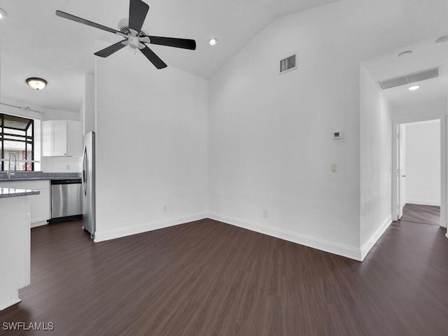 unfurnished living room featuring sink, vaulted ceiling, ceiling fan, and dark hardwood / wood-style flooring