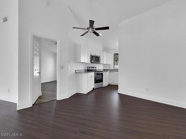 unfurnished living room featuring high vaulted ceiling, dark hardwood / wood-style flooring, and ceiling fan