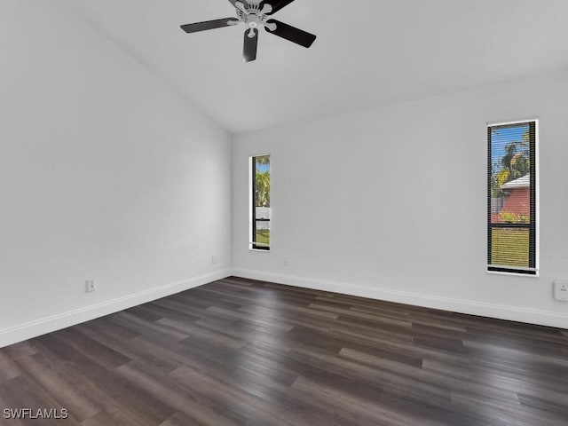 unfurnished room featuring dark wood-type flooring, high vaulted ceiling, and ceiling fan