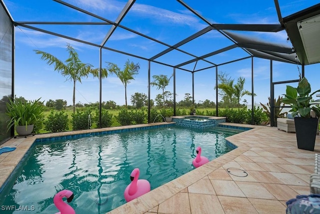 view of swimming pool with glass enclosure, an in ground hot tub, and a patio