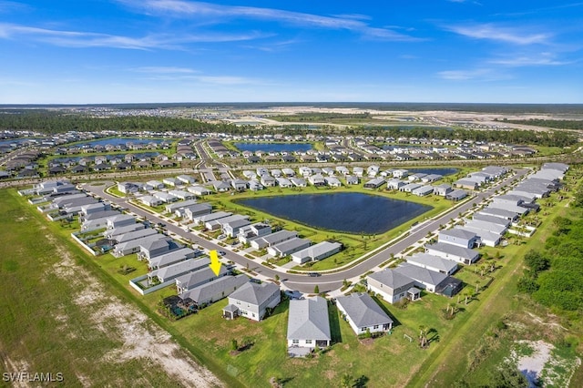 drone / aerial view featuring a water view