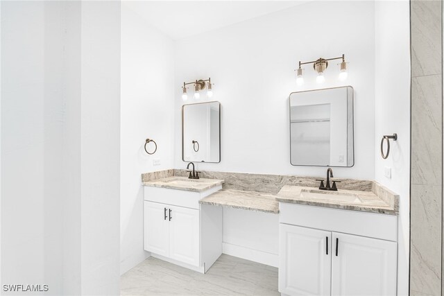 27159 Alhambra Dr, Punta Gorda, FL 33955 - full bathroom featuring marble look tiles and double vanity