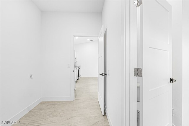 27159 Alhambra Dr, Punta Gorda, FL 33955 - hallway with baseboards, recessed lighting, and light marble finish floors