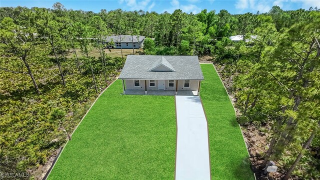 27159 Alhambra Dr, Punta Gorda, FL 33955 - view of subject property featuring a forest