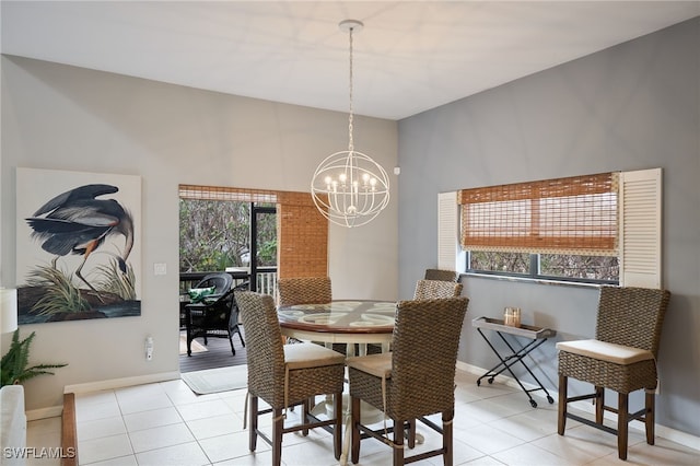 dining space with a notable chandelier and light tile patterned flooring