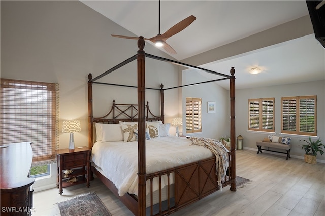 bedroom featuring lofted ceiling, ceiling fan, and light hardwood / wood-style floors