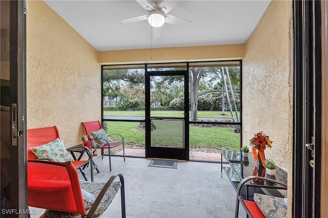 sunroom / solarium with ceiling fan