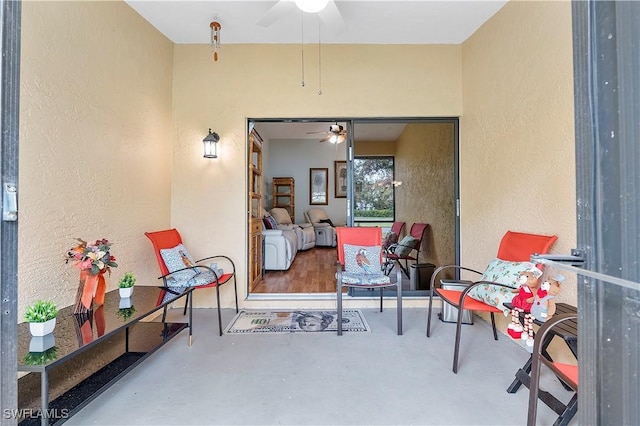 view of patio / terrace featuring ceiling fan