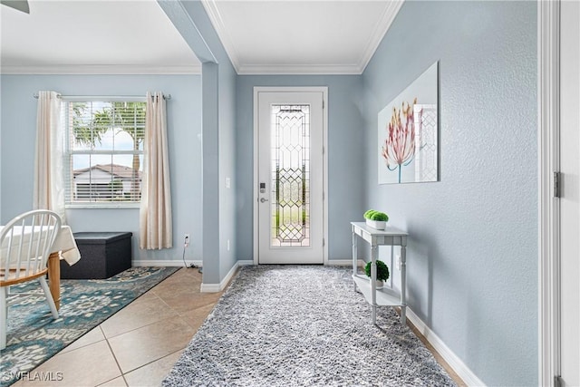 tiled entrance foyer with crown molding