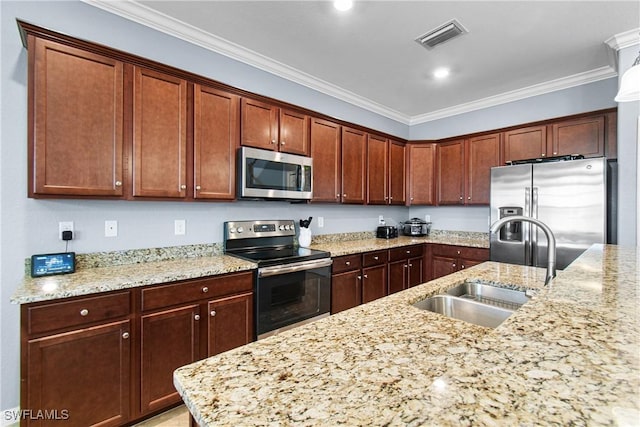 kitchen featuring light stone counters, sink, crown molding, and stainless steel appliances