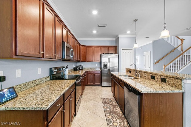 kitchen featuring stainless steel appliances, a kitchen island with sink, hanging light fixtures, crown molding, and sink