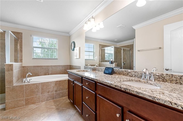 bathroom featuring tile patterned flooring, vanity, ornamental molding, and plus walk in shower