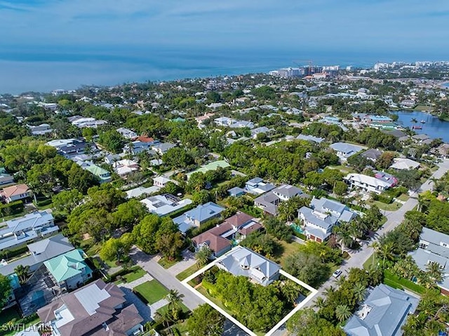 drone / aerial view with a water view