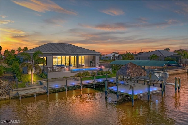 dock area with a water view