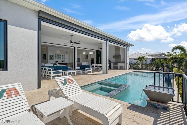 view of pool featuring an in ground hot tub, outdoor lounge area, ceiling fan, and a patio area