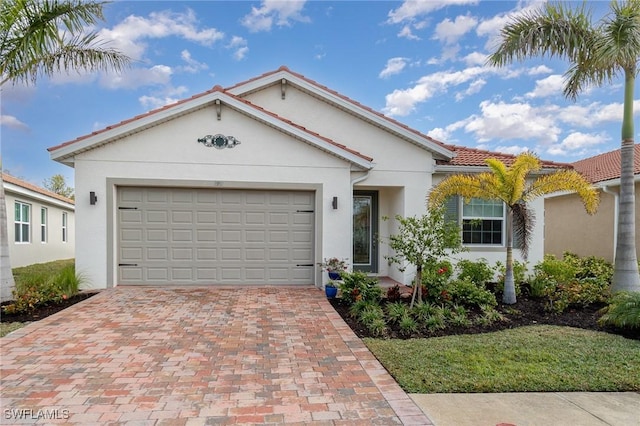 view of front of property featuring a garage