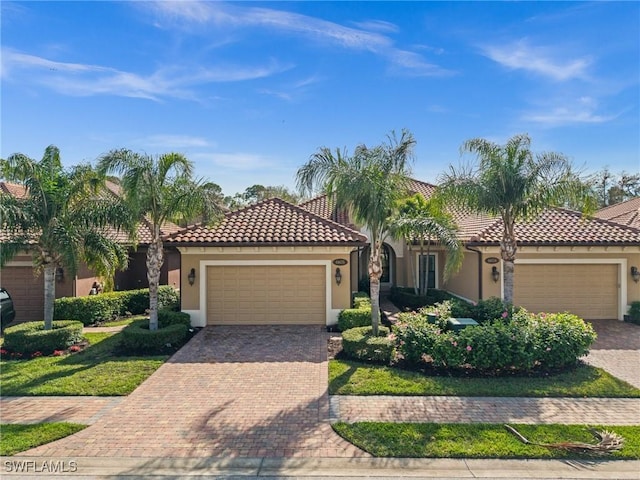 mediterranean / spanish-style home featuring a garage