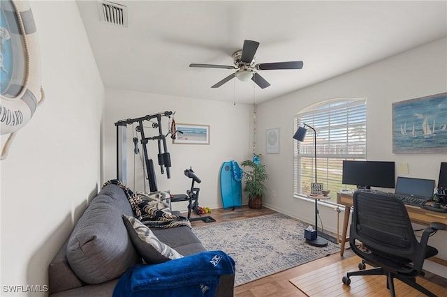 office space featuring ceiling fan and hardwood / wood-style floors