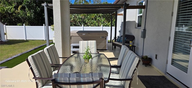 view of patio with a hot tub and a pergola