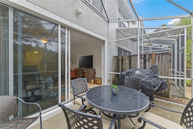 view of patio / terrace with glass enclosure