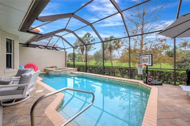 view of pool with an in ground hot tub, a lanai, and a patio area