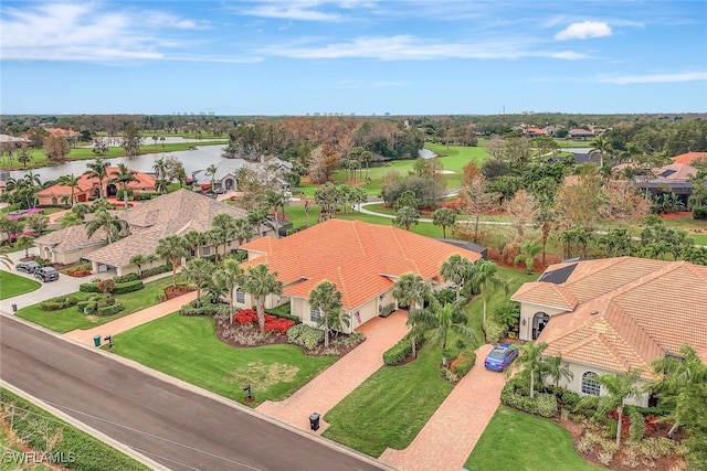 drone / aerial view with a water view