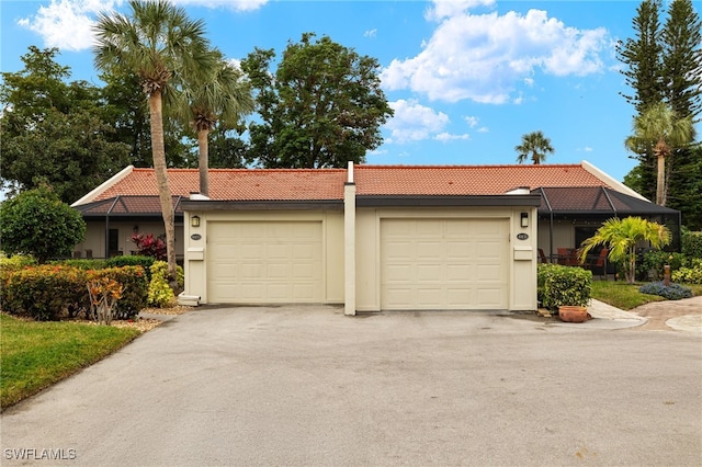 single story home featuring a garage