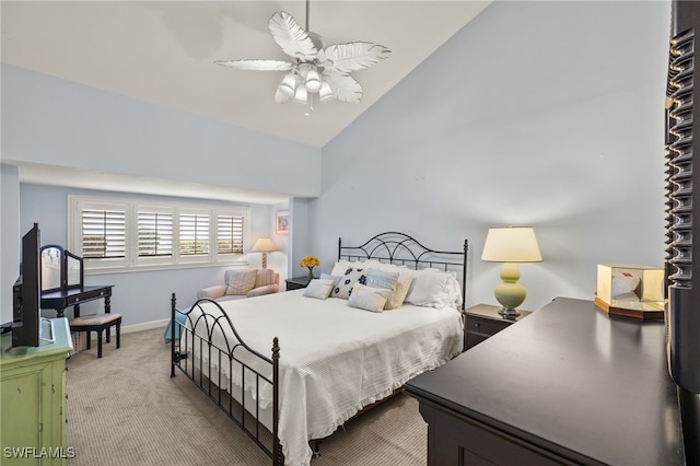 bedroom with light carpet, ceiling fan, and high vaulted ceiling