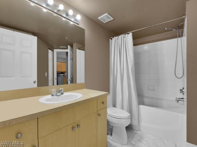 full bathroom featuring toilet, vanity, tile patterned floors, and shower / bath combination with curtain