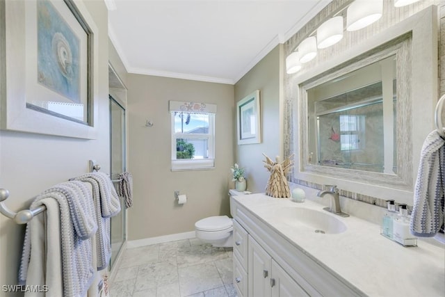 bathroom featuring an enclosed shower, vanity, toilet, and crown molding