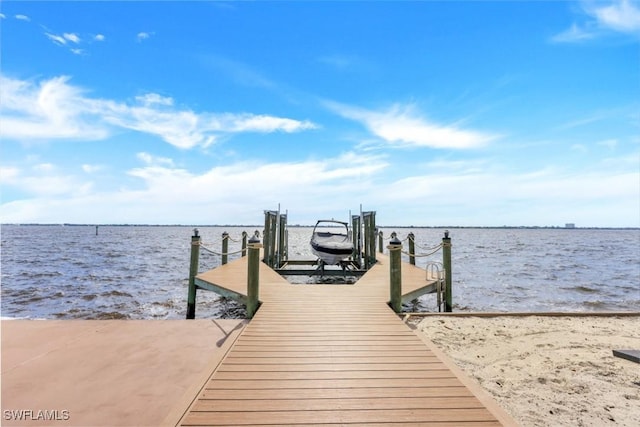 view of dock with a water view