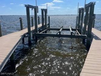 view of dock with a water view