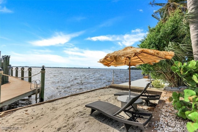 view of dock with a water view