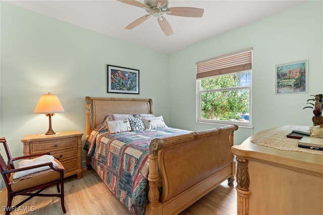 bedroom featuring ceiling fan and light hardwood / wood-style flooring