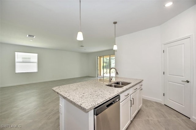 kitchen featuring stainless steel dishwasher, pendant lighting, sink, white cabinets, and an island with sink