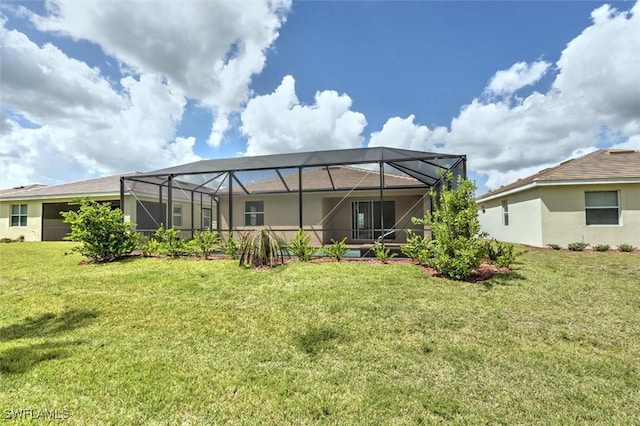 back of house featuring a lanai and a lawn