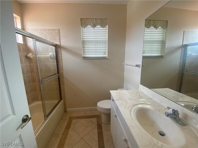 3054 Driftwood Way Unit 4508, Naples, FL 34109 - full bathroom with tile patterned floors, plenty of natural light, vanity, and combined bath / shower with glass door