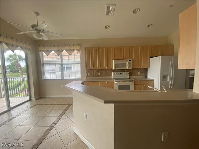 3054 Driftwood Way Unit 4508, Naples, FL 34109 - kitchen featuring white appliances, a ceiling fan, light countertops, tasteful backsplash, and recessed lighting
