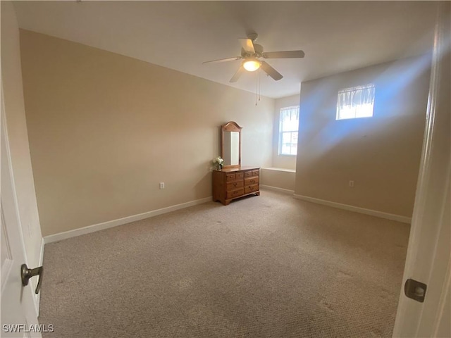 3054 Driftwood Way Unit 4508, Naples, FL 34109 - unfurnished room with light carpet and a ceiling fan