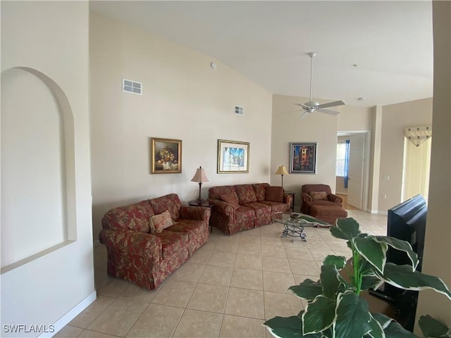 3054 Driftwood Way Unit 4508, Naples, FL 34109 - living room with light tile patterned floors, high vaulted ceiling, ceiling fan, and arched walkways